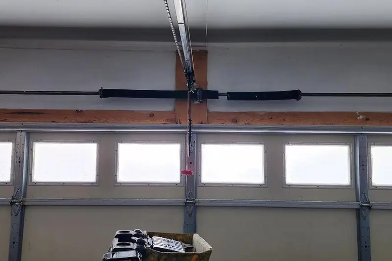 DPS Garage Doors newly installed dual torsion springs on a garage door in the GTA