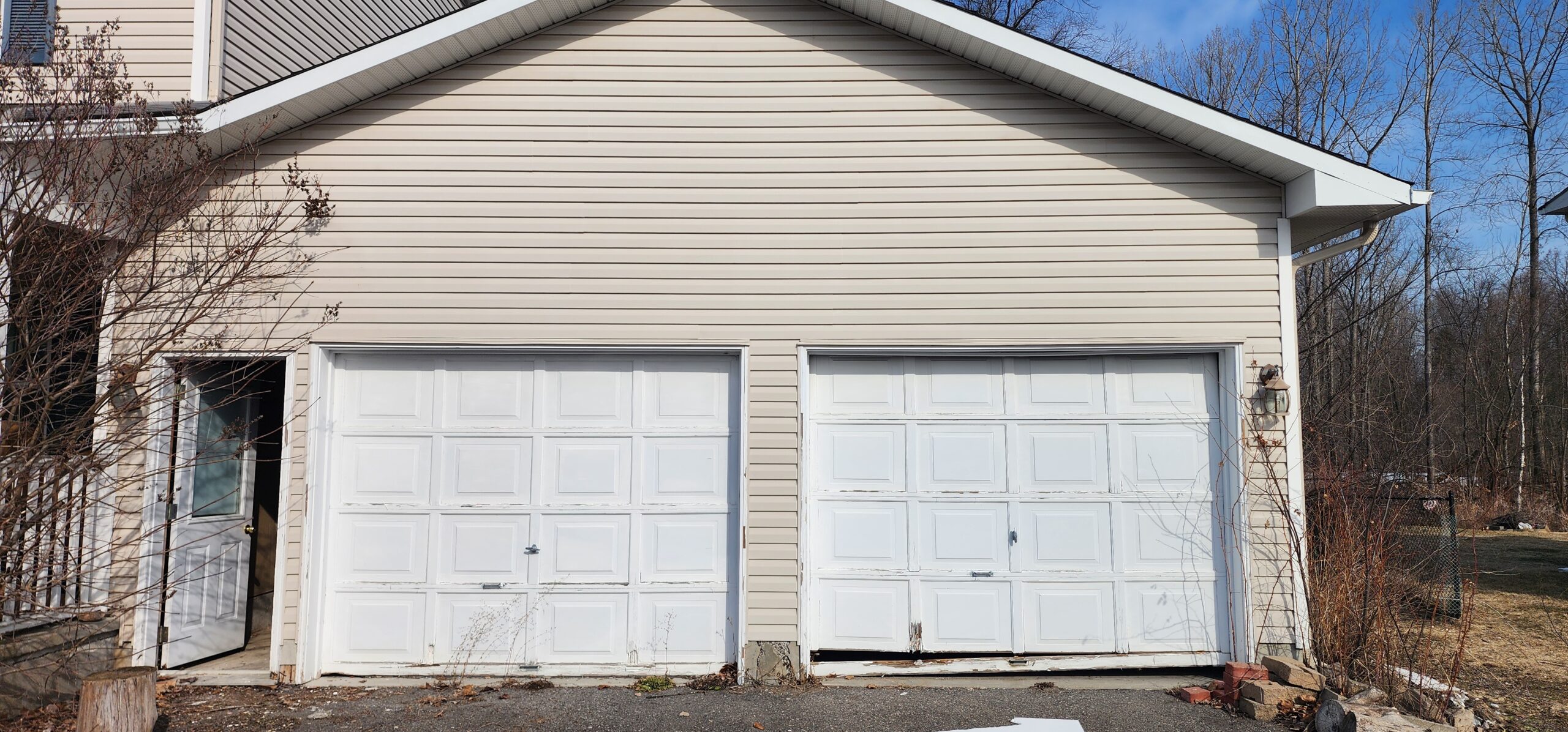 Old damaged garage door before